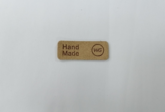 Il cuoio impresso dell'unità di elaborazione di Logo Microfiber rattoppa le etichette lavabili cuce su abbigliamento