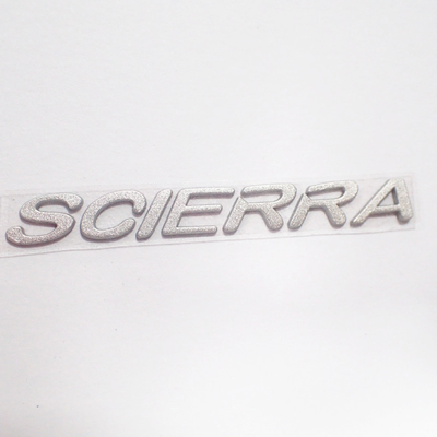 Le etichette su misura dell'abbigliamento del trasferimento di calore del silicone 3D con argento Shinny il colore