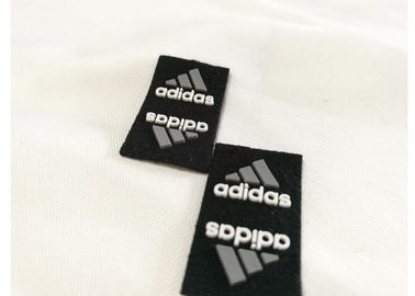 Toppe di gomma di logo di logo su ordinazione di marca commerciale per l'iniezione di Mirco dell'abbigliamento