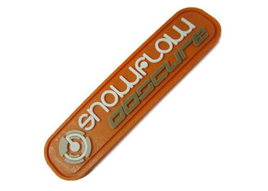 L'abbigliamento su ordinazione colorato logo impresso rattoppa gli accessori di gomma dell'indumento del distintivo