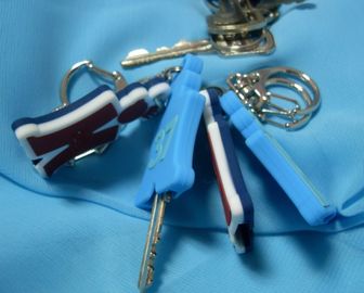 I regali promozionali personali novità hanno impresso il PVC Keychain di logo con la luce del LED
