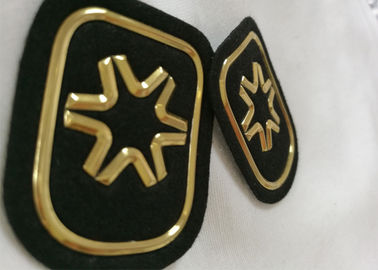 Il nero e l'oro hanno impresso i distintivi su ordinazione del Velcro delle toppe della gomma 3D per Soprtswear