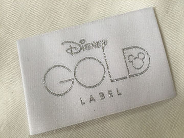 L'abbigliamento tessuto popolare dell'estremità di Bage dell'oro di Disney identifica il taglio freddo/taglio del calore
