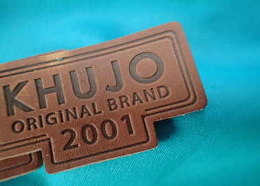 Etichette genuine personali ed etichette del cuoio impresso di logo del metallo per i vestiti