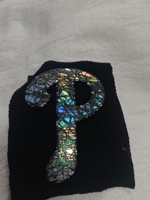 Distintivo personalizzato in TPU Symphony per indumenti OEM con ologramma arcobaleno TPU