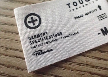 Etichette dell'abbigliamento tessute cotone con il logo bianco del grafico di stampa e del fondo