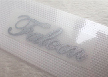 La personalizzazione delle etichette dell'abbigliamento del trasferimento di calore di colore e della fonte/calore del silicio preme le etichette