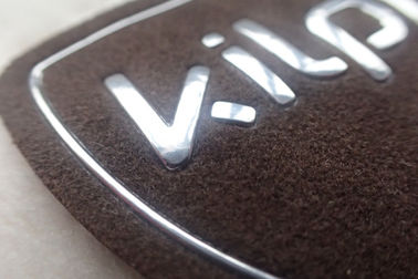 Il cuoio impresso del trasferimento di calore su ordinazione rattoppa il logo 3D su pelle scamosciata, etichette dei vestiti TPU