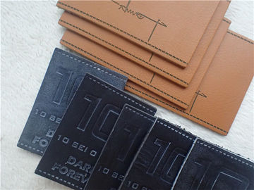 Toppe di logo impresse cuoio amichevole eco- dell'unità di elaborazione per colore di Pantone dei jeans