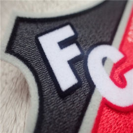 L'abbigliamento su ordinazione durevole e lavabile rattoppa la peluche irregolare dello schermo cromaticamente che si affolla