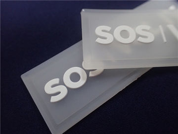 Le toppe di gomma su ordinazione lavabili di logo, cucono - sul distintivo del silicone per il cappello
