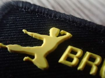 L'abbigliamento su ordinazione di colore di Pantone rattoppa l'etichetta tessuta il bordo di collegamento dell'iniezione del silicio 3D