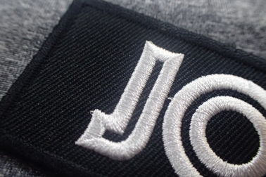 Distintivo ricamato poliestere del taglio di calore